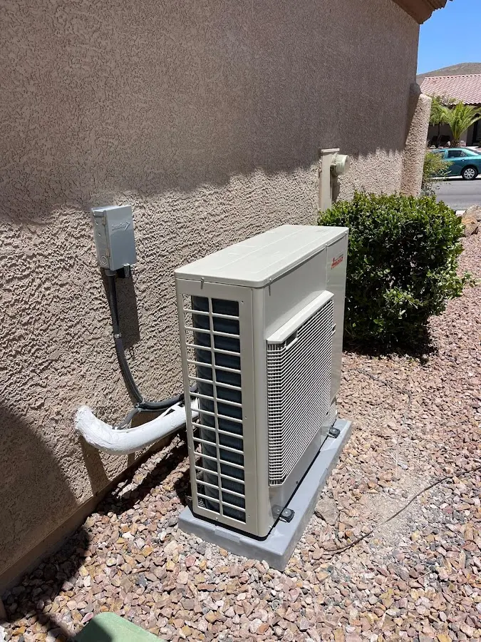 Residential air conditioning condenser unit in Brush